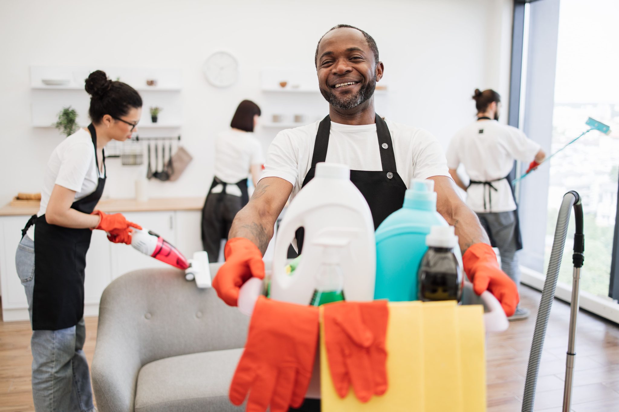 african-man-professional-cleaning-worker-holding-a-2024-12-13-13-26-09-utc