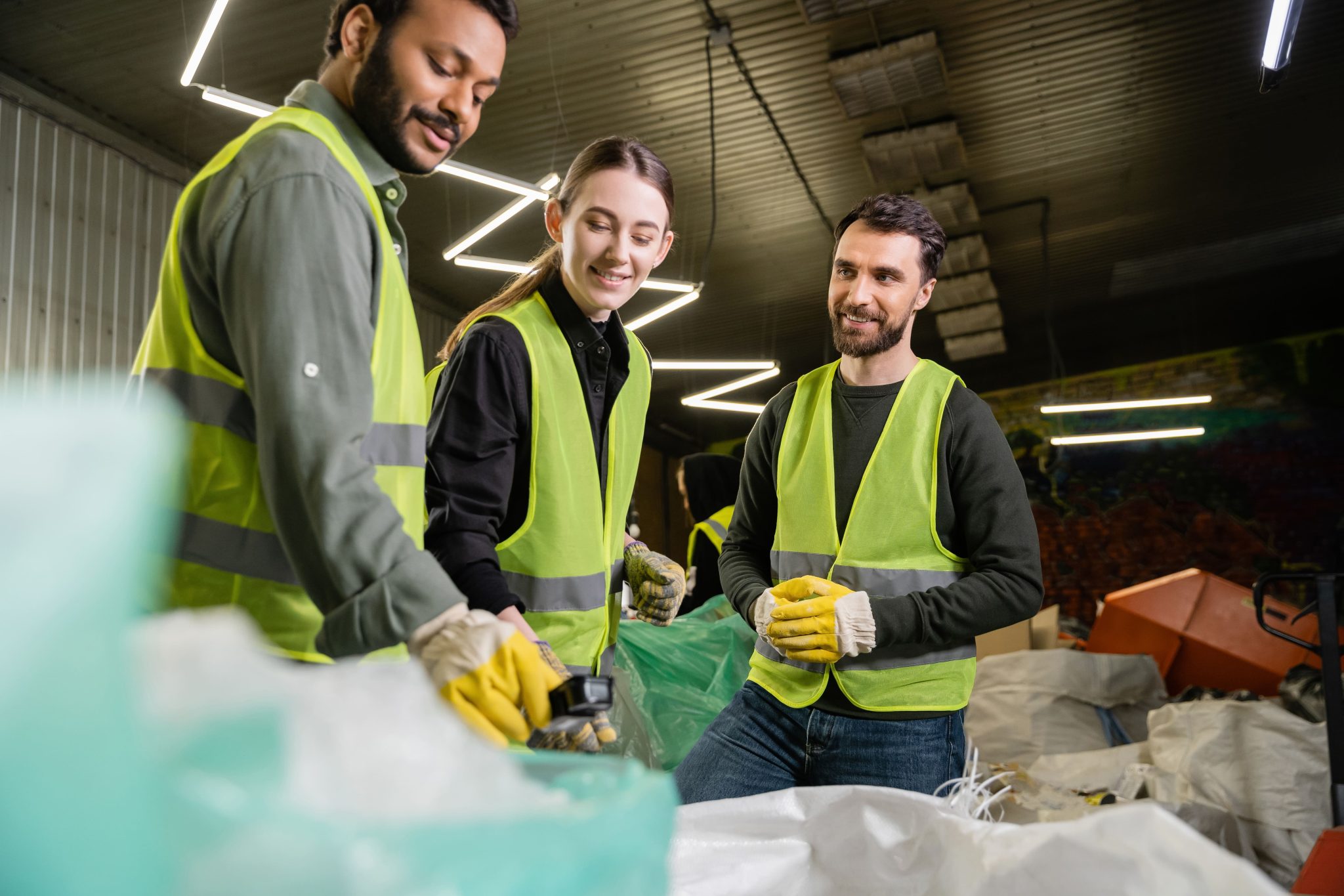 smiling-workers-in-high-visibility-vests-standing-2024-11-13-02-53-39-utc
